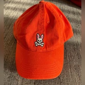 Orange Psycho Bunny hat. Never been worn